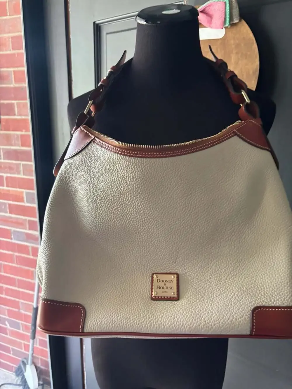 Dooney and Bourke White Leather Hobo Bag with Brown Trim,